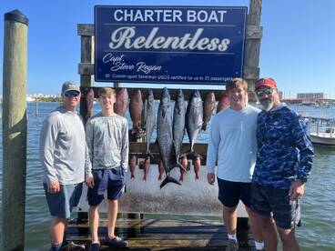 Two dads makeing menories with their son