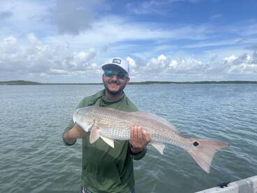 Dante with his 28 inch redfish