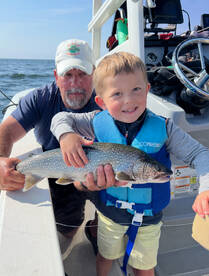 Lil Easton caught his first lake trout!!