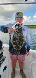 Kids have been reeeling in the flounder