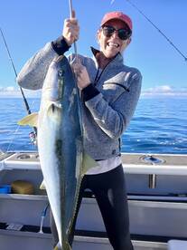 Aussie angler Robin Harris with her 1st big kingie