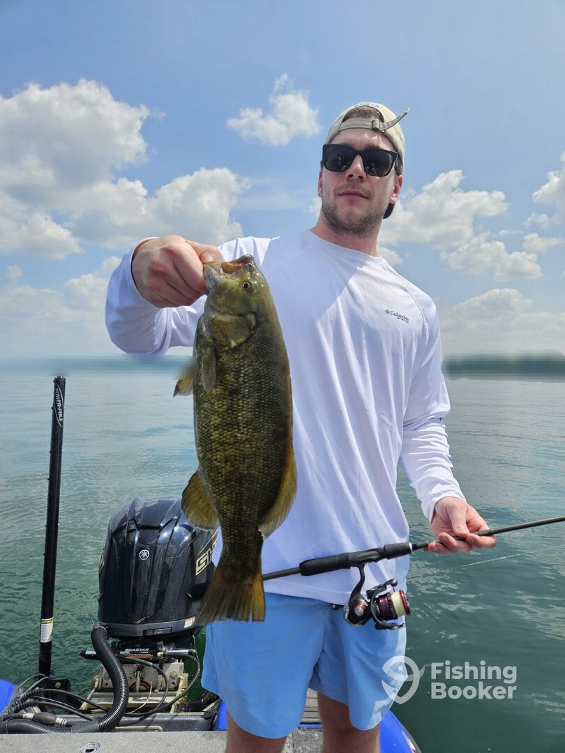 Client O with a big Erie smallmouth bass
