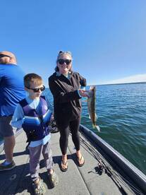 Client of Big Fat Bass Guide Service with walleye