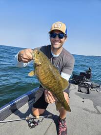 Client of Big Fat Bass Guide Service with a bass