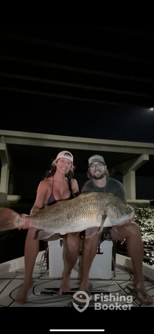 My woman with a trophy black drum