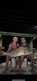 My woman with a trophy black drum
