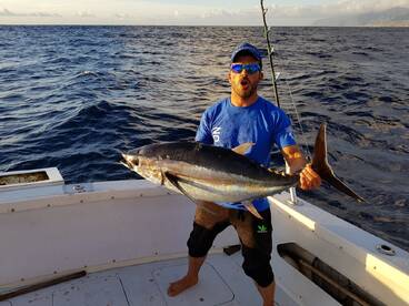 Captain juan with a albacore tuna