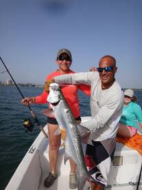 The Tucker Family with one of their 2 tarpons released. Fishing in San Juan