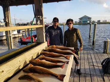 Big Reds on a tough, windy day!