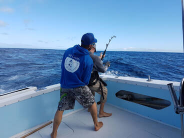 Catching a massive tuna stand up!