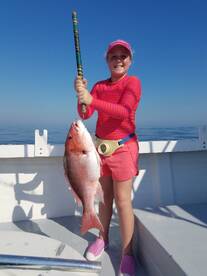 Big red snapper! Happy girl
