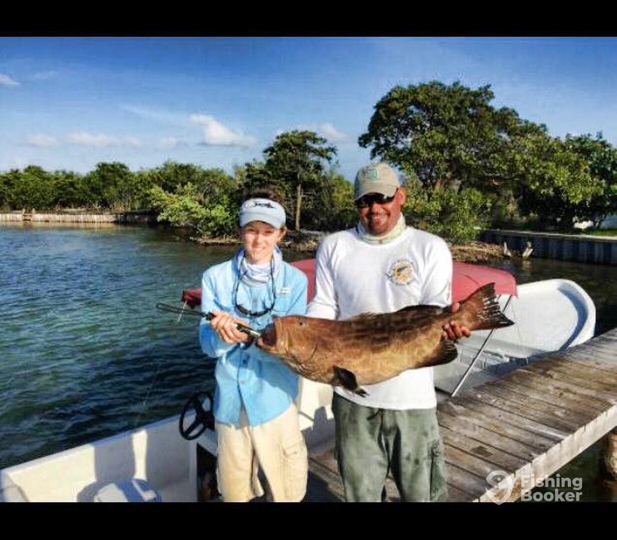 Thats Gavin in the picture with his catch! Esley on the right!