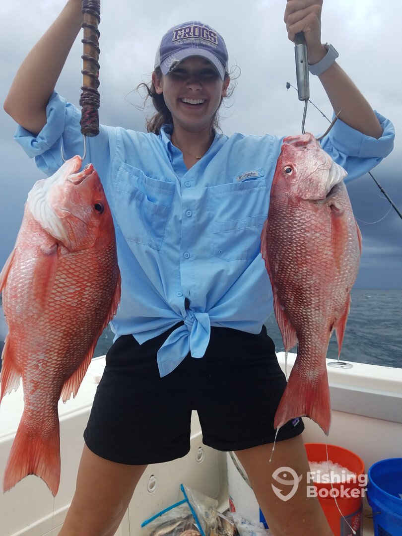 Madi posing with her Red Snappers