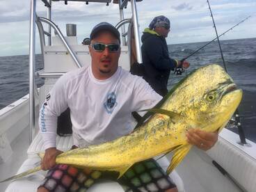 Big mahi ate a live bait 5ft from the boat!