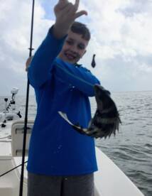 Boy holding sheepshead Navarre, FL