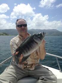 Chris Ireland with His best Rainbow Bass