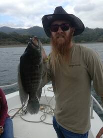 Logan Metzer with His best Rainbow Bass
