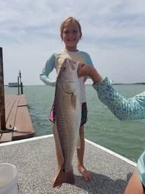 Kaitlyn caught this and other red fish o