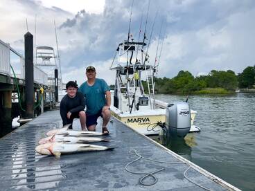 Father and son fun in cloudy conditions