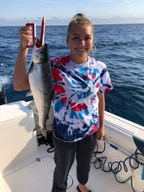 Coho Salmon Reeled In by High School Girl