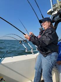 Sara is having a great time reeling in the big one