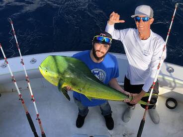Catching Mahi Mahi aboard Hooked Up