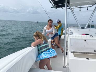 Mom takes the kids fishing!