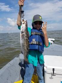 Grayson catching a nice trout