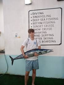 A lad's best reward from fishing. 