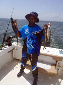 Lamont striking the mighty fisherman pose