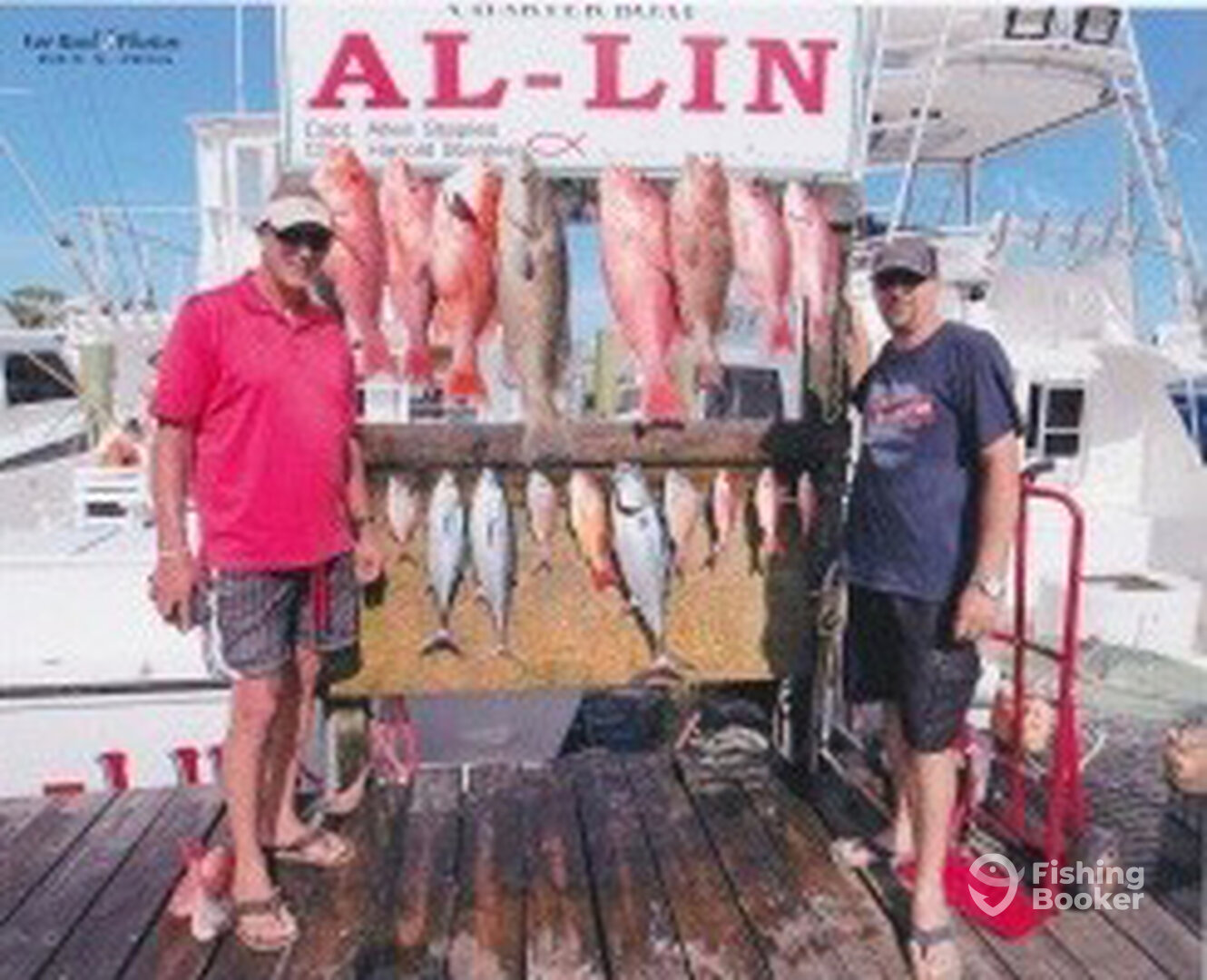 Two avid fishermen and their Snapper catch