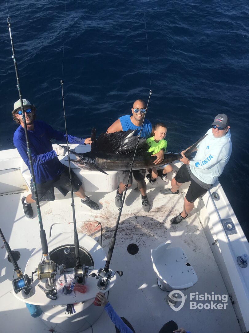 TIm Emanuel and his son Uria with a nice sail.