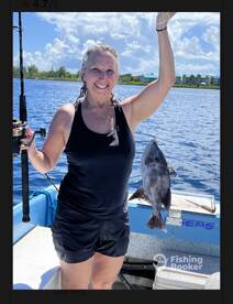 Lady angler with one of her few catch 