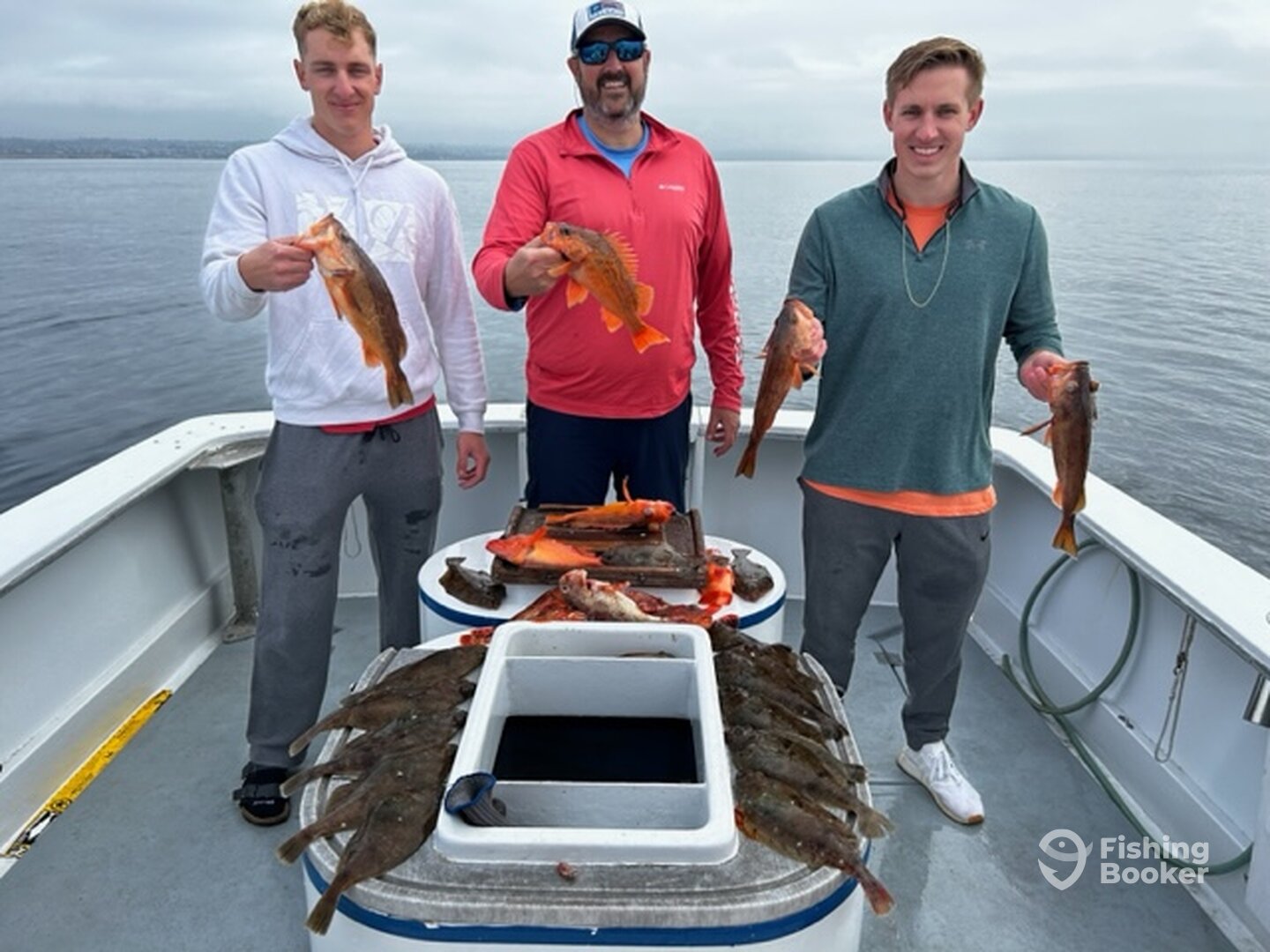 Dad and two sons fishing together
