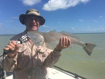 David and a healthy flamingo redfish