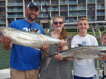 A family that fishes together, smiles together.
