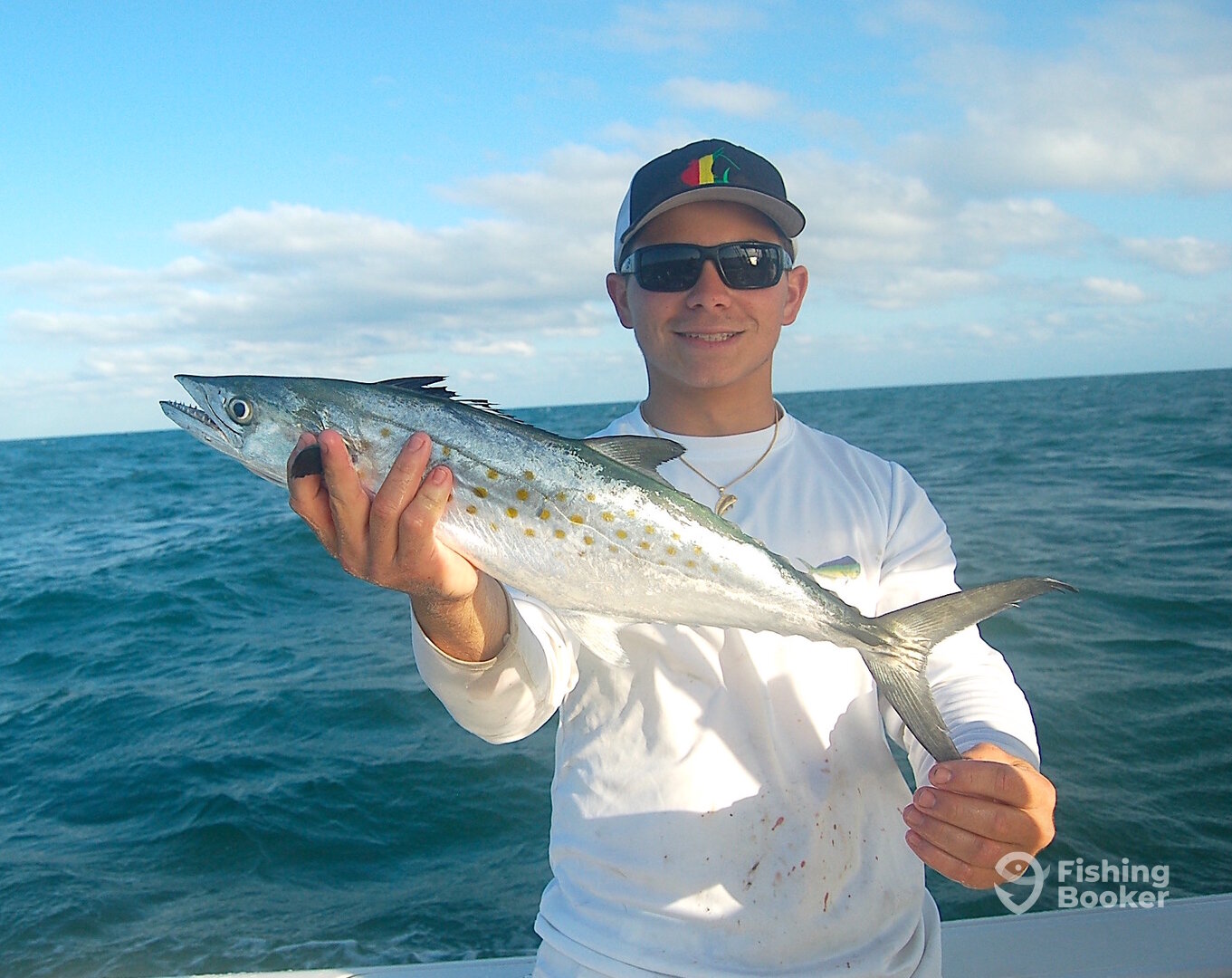 Logan with a nice Spanish mackerel taken over the Peck Lake reefs off Hobe Sound.
