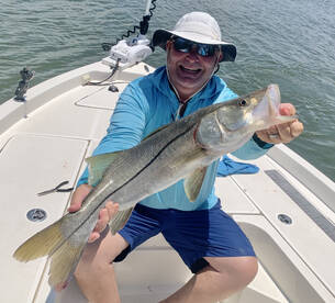 His biggest snook! 33.5”!