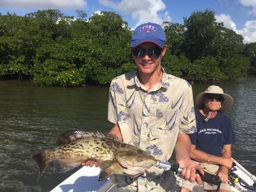 Cooper with a 25'' gag grouper, a rare catch in the backwaters!