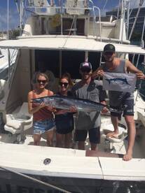 Wahoo and White Marlin release flag. Proud Angler holding the flag!