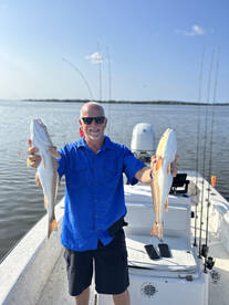 Redfish busting shrimp