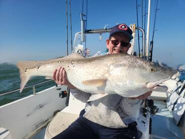 Brother Phil B. Caught citation reds and trout