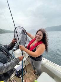 Mariah with her first salmon caught… i
