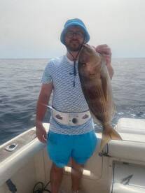 Eating fish back at the harbour.