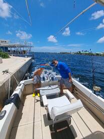 Father and son day on the water. 