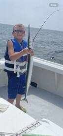 Young fella gog him a rare catch