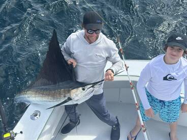 Young Man catches Sail Fish all by himself