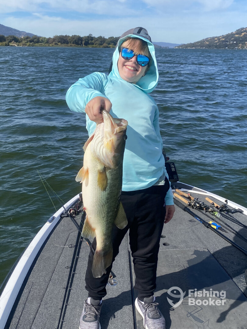 Luke with a giant 7 lb bass taken on a crankbait.