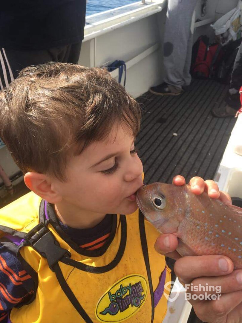 Little fella using the kiss and release method!
