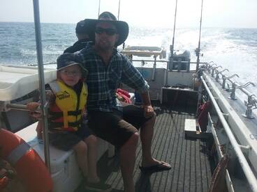 Father and son enjoyng a beautiful day out on the Whitsundays!